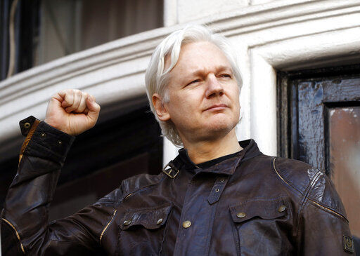 FILE - In this May 19, 2017 file photo, WikiLeaks founder Julian Assange greets supporters outside the Ecuadorian embassy in London, where he has been in self imposed exile since 2012. Judge Vanessa Baraitser has ruled that Julian Assange cannot be extradited to the US. because of concerns about his mental health, it was reported on Monday, Jan. 4, 2021. Assange had been charged under the US’s 1917 Espionage Act for “unlawfully obtaining and disclosing classified documents related to the national defence”. (AP Photo/Frank Augstein, File) PHOTO CREDIT: Frank Augstein