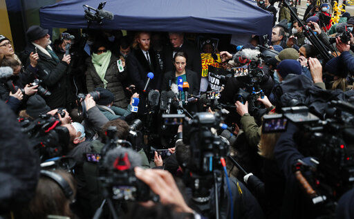 Stella Moris girlfriend of Julian Assange speaks to the media after a ruling that he cannot be extradited to the United States, outside the Old Bailey in London, Monday, Jan. 4, 2021. A British judge has rejected the United States
