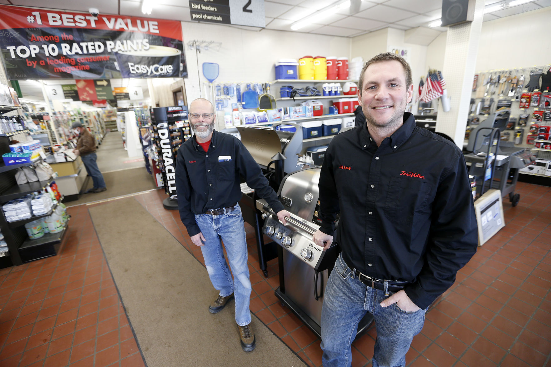 Jesse Kueter (right) recently purchased what is now called Kueter True Value in Bellevue, Iowa, from Chris Lampe, who took over what was then Lampe True Value from his parents, Larry and Maryetta Lampe, 27 years ago. PHOTO CREDIT: Dave Kettering