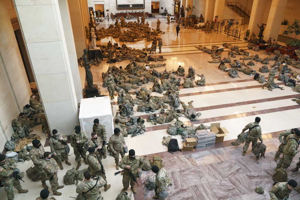 Hundreds of National Guard troops stage inside the Capitol Visitor