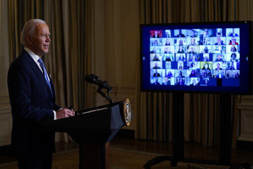 President Joe Biden speaks during a virtual swearing in ceremony of political appointees from the State Dining Room of the White House on Wednesday, Jan. 20, 2021, in Washington. (AP Photo/Evan Vucci) PHOTO CREDIT: Evan Vucci