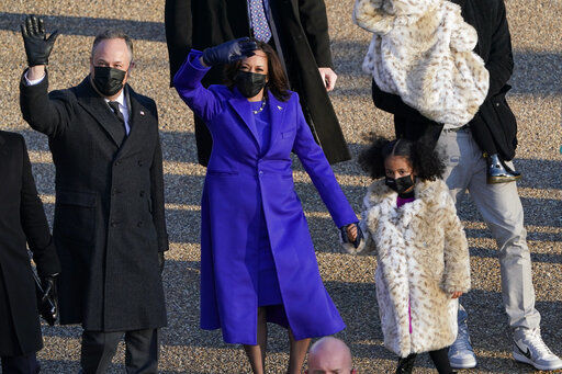 Vice President Kamala Harris and her husband Doug Emhoff walk in the parade during the Presidential Escort, part of Inauguration Day ceremonies, Wednesday, Jan. 20, 2021, in Washington. (AP Photo/David J. Phillip) PHOTO CREDIT: David J. Phillip