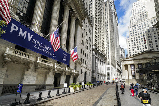 Stocks were slightly higher in late-morning trading on Wall Street today, helped by better-than-expected earnings from blue chip companies like Johnson & Johnson and General Electric.  PHOTO CREDIT: John Minchillo