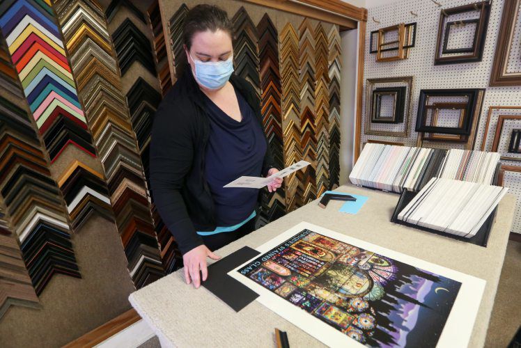 Katie Gross works on a framing project at Tri State Blueprint and Framing. PHOTO CREDIT: NICKI KOHL