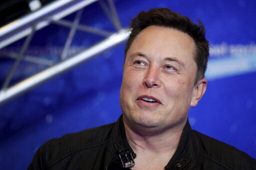 Tesla says it has invested more than $1 billion in Bitcoin and will accept the digital currency as payment for its electric vehicles. In a regulatory filing, Elon Musk’s electric vehicle company said its board approved of the $1.5 billion investment and potentially more in the future. PHOTO CREDIT: Hannibal Hanschke