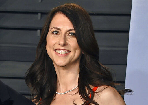FILE - In this March 4, 2018, file photo, then-MacKenzie Bezos arrives at the Vanity Fair Oscar Party in Beverly Hills, Calif. MacKenzie Scott is one of the 50 Americans who gave the most to charity in 2020, according to the Chronicle of Philanthropy’s annual rankings. (Photo by Evan Agostini/Invision/AP, File) PHOTO CREDIT: Evan Agostini