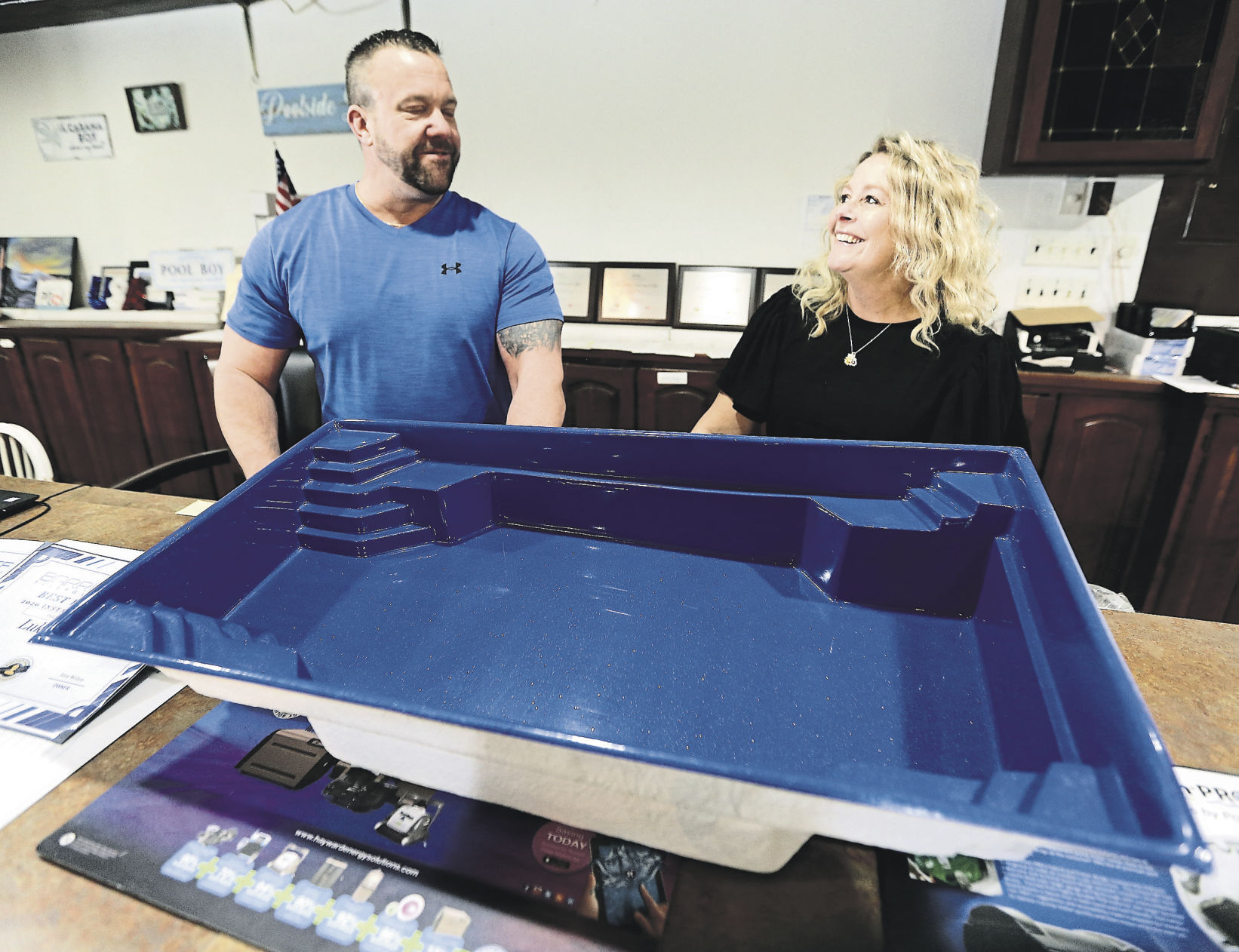 Luke and Brooke Tigges, the owners of Tri-State Pool & Spa in East Dubuque, Ill., specialize in fiberglass and in-ground pools. PHOTO CREDIT: Dave Kettering
