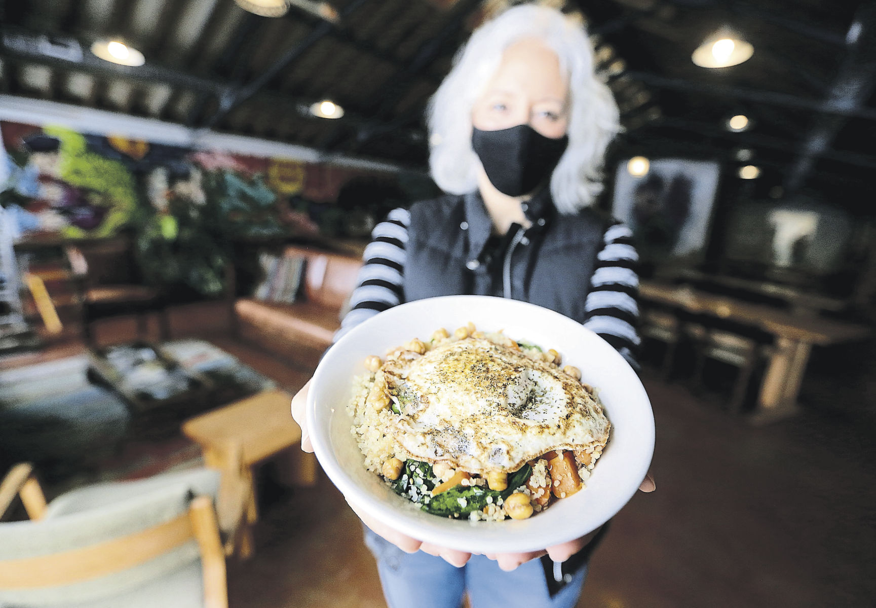 Leslie Shalabi, co-founder of Convivium, displays a sweet potato quinoa bowl. PHOTO CREDIT: JESSICA REILLY