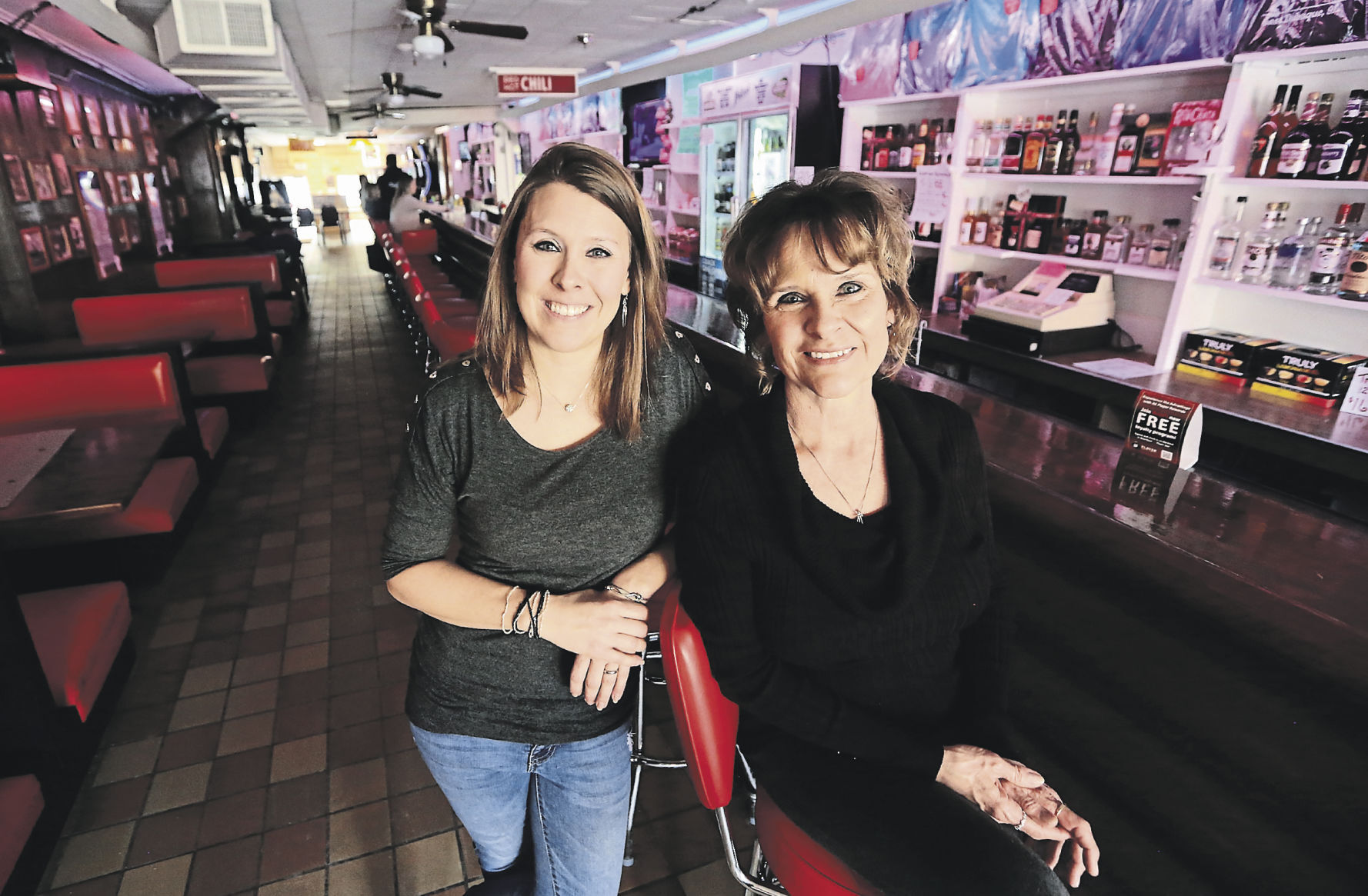 Owner Dalene Temperley (right) and her daughter, Terissa Ohnesorge, operate Mulgrew’s Tavern, Slots & Liquor Store in East Dubuque, Ill. They have continued the establishment’s family ownership tradition that began 100 years ago. PHOTO CREDIT: NICKI KOHL