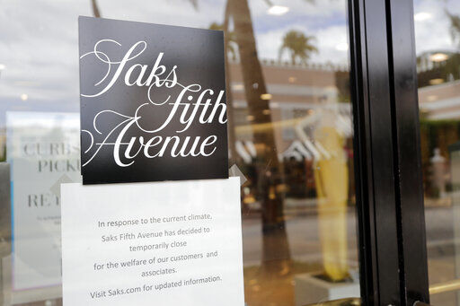 Saks Fifth Avenue is spinning off its website into a separate company today, with the hopes of expanding that business at a time when more people are shopping online.  PHOTO CREDIT: Lynne Sladky