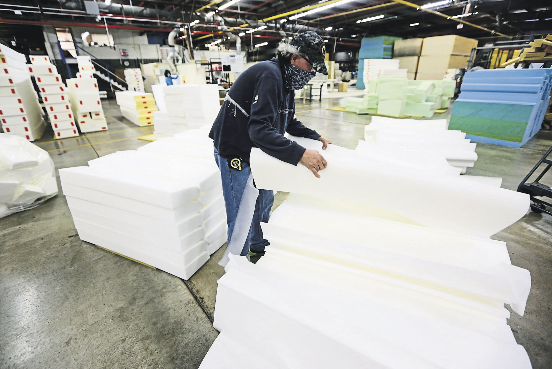 James Boal prepares material for assembly at the company’s plant on Kerper Boulevard. It supplies material to customers in Dubuque and nationally. PHOTO CREDIT: NICKI KOHL