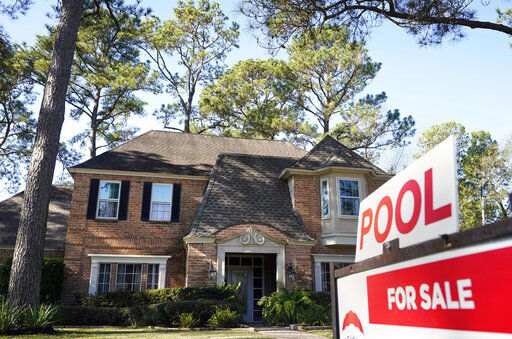 The red-hot U.S. housing market is paying off for many homeowners, even those who aren’t looking to sell their home. Real estate information company CoreLogic says, on average, homes with a mortgage gained $26,300 in equity over the last three months of 2020 versus a year earlier.  PHOTO CREDIT: Melissa Phillip
