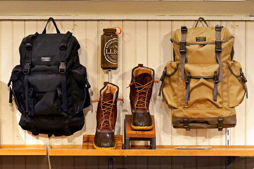 Backpacks and Bean Boots are displayed at the L.L. Bean flagship retail store, Thursday, March 18, 2021, in Freeport, Maine. Maine-based retailer L.L. Bean saw the best sales in nearly a decade during pandemic. Officials say the Freeport-based retailer started its fiscal year with store closings and worries about survival but the company weathered the turbulent times to revenue growth of 5%. (AP Photo/Robert F. Bukaty) PHOTO CREDIT: Robert F. Bukaty