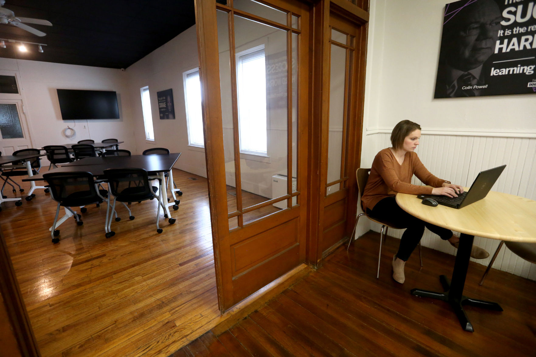 Katelyn Wolfe, with the Cascade Area Chamber of Commerce, works at The Innovation Lab in Cascade, Iowa, on Tuesday. PHOTO CREDIT: JESSICA REILLY