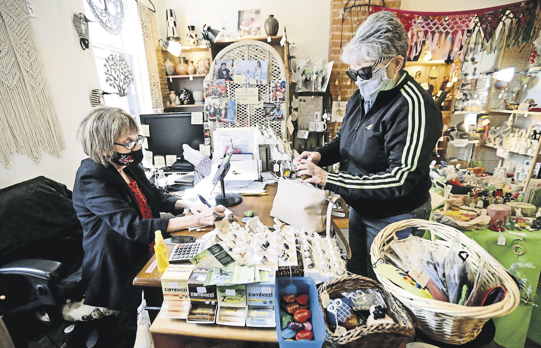 Owner Patty Jackson (left) talks with Dena Grutz, of Platteville, Wis., at A Ripple Effect. PHOTO CREDIT: Jessica Reilly