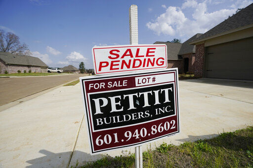 A "Sale Pending" sign stands along side a new driveway in Madison County, Miss., Tuesday, March 16, 2021. U.S. home prices increased at the fastest pace in seven years in January as the pandemic has fueled demand for single-family houses even as the supply for such homes shrinks. The S&P CoreLogic Case-Shiller 20-city home price index, released Tuesday, March 20, rose 11.1% in January from a year earlier. (AP Photo/Rogelio V. Solis) PHOTO CREDIT: Rogelio V. Solis