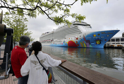 Norwegian Cruise Line’s parent company asked the Centers for Disease Control and Prevention for permission to resume cruises from U.S. ports on July 4 by requiring passengers and crew members to be vaccinated against COVID-19 at least two weeks before the trip. PHOTO CREDIT: Richard Drew