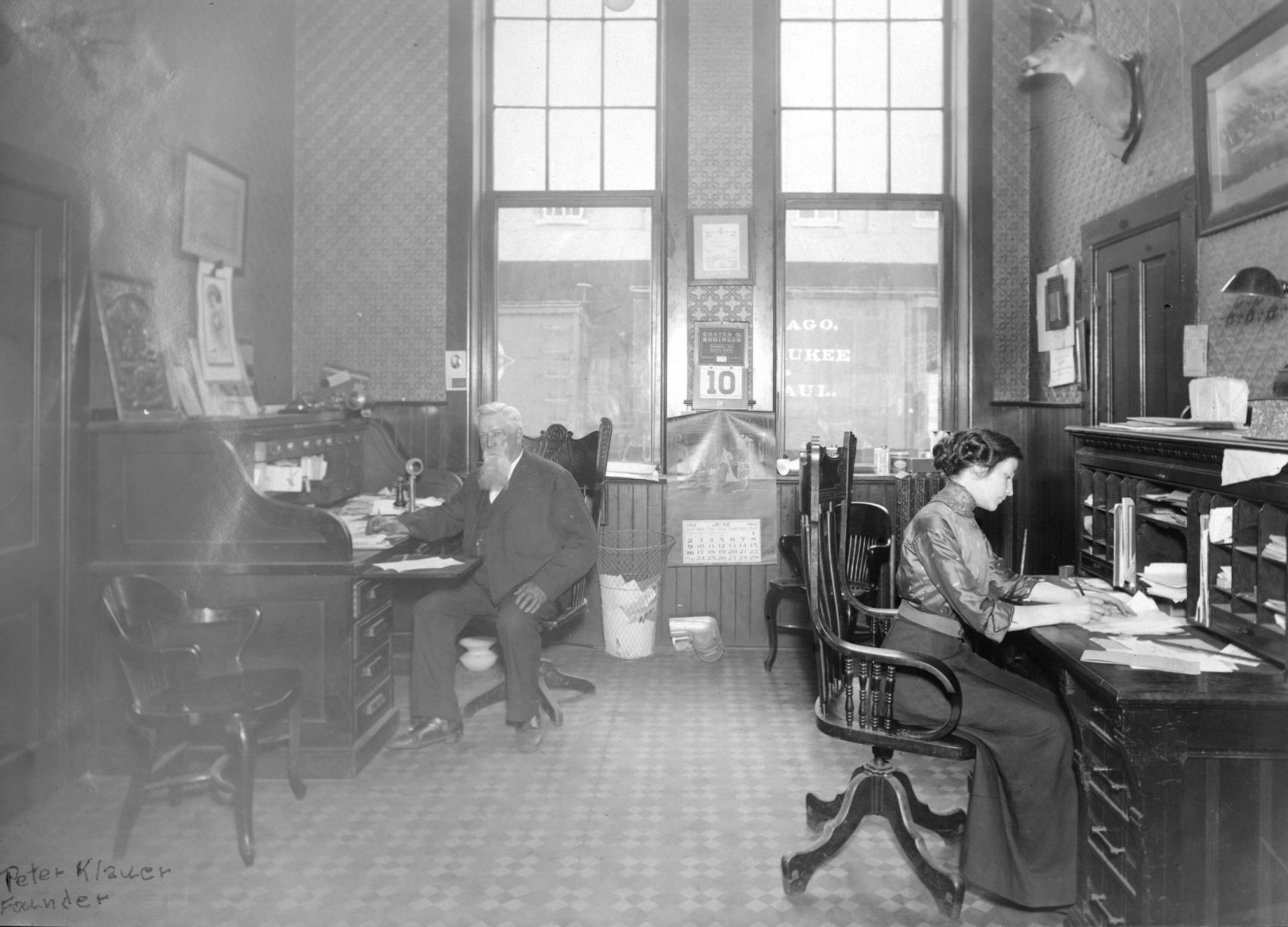 Klauer Manufacturing founder Peter Klauer at his desk in June 1912. Photo is from the Klauer Collection, Loras College Center for Dubuque History. Then, his office and factory were at Ninth and Washington.    PHOTO CREDIT: Contributed