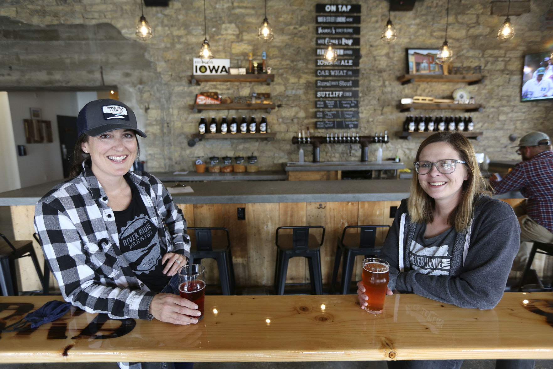 River Ridge Brewing opened its new location along the Mississippi River in Bellevue, Iowa, on Friday, April 9, 2021. Pictured are two of the co-owners, Kelly Hueneke (left) and Allison Simpson. PHOTO CREDIT: Dave Kettering