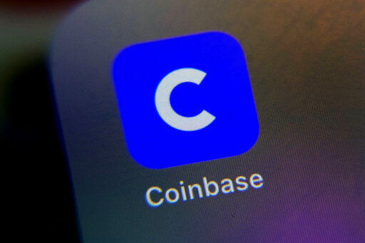 The mobile phone icon for the Coinbase app is shown in this photo, in New York, Tuesday, April 13, 2021. Coinbase is going public at a time when chatter about cryptocurrencies is everywhere, even at the United States Federal Reserve. (AP Photo/Richard Drew) PHOTO CREDIT: Richard Drew
