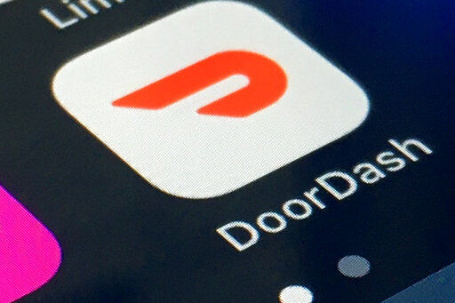 DoorDash is launching lower-priced delivery options for U.S. restaurants, responding to criticism that the commissions it charges are too high for the beleaguered industry.  PHOTO CREDIT: STF