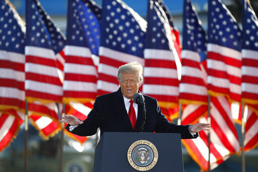 FILE - President Donald Trump speaks to crowd before boarding Air Force One at Andrews Air Force Base, Md., in this Wednesday, Jan. 20, 2021, file photo. Former President Donald Trump will find out this week whether he gets to return to Facebook. The social network’s quasi-independent Oversight Board says it will announce its decision Wednesday, May 5 on a case concerning the former president. Trump