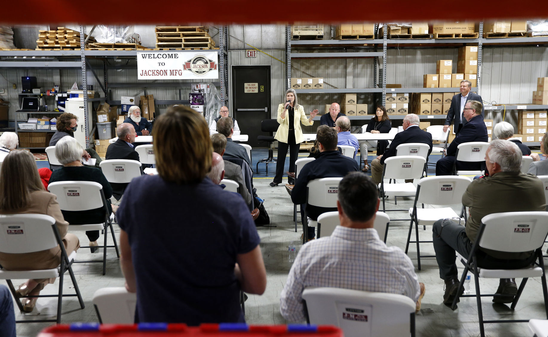 U.S. Sen. Joni Ernst, R-Iowa, speaks to attendees at Jackson Manufacturing in Maquoketa, Iowa, on Wednesday. PHOTO CREDIT: Dave Kettering