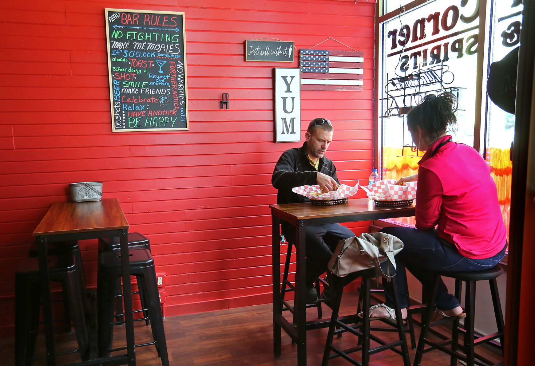 Chris Wand and his wife, Jennifer, of Dubuque, eat lunch at Third Corner Food & Spirits in Dubuque on Thursday.    PHOTO CREDIT: JESSICA REILLY