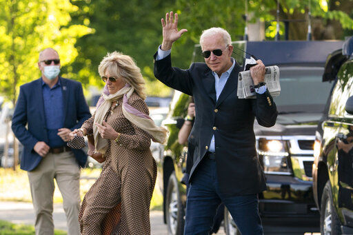 President Joe Biden with first lady Jill Biden waves as they walk on the Ellipse near the White House. The Treasury Department said today that 39 million families are set to receive monthly child payments beginning on July 15. PHOTO CREDIT: Manuel Balce Ceneta