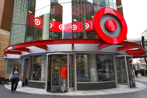 FILE - In this July 10, 2019, file photo shoppers visit the downtown Target store in Minneapolis. Target has reported surging sales and profits for its fiscal first quarter thanks to shoppers who bought more apparel as they emerge from the pandemic. (AP Photo/Jim Mone, File) PHOTO CREDIT: Jim Mone