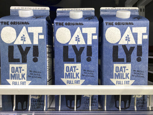 Oatly containers are displayed at a grocery store, Tuesday, in North Miami, Fla. PHOTO CREDIT: Marta Lavandier
