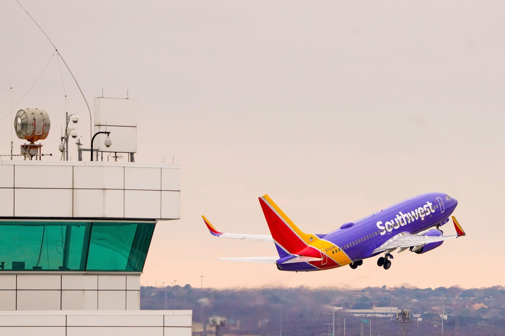 Southwest Airlines is planning to bring back more drink options, including alcoholic beverages, this year.  PHOTO CREDIT: Tribune News Service