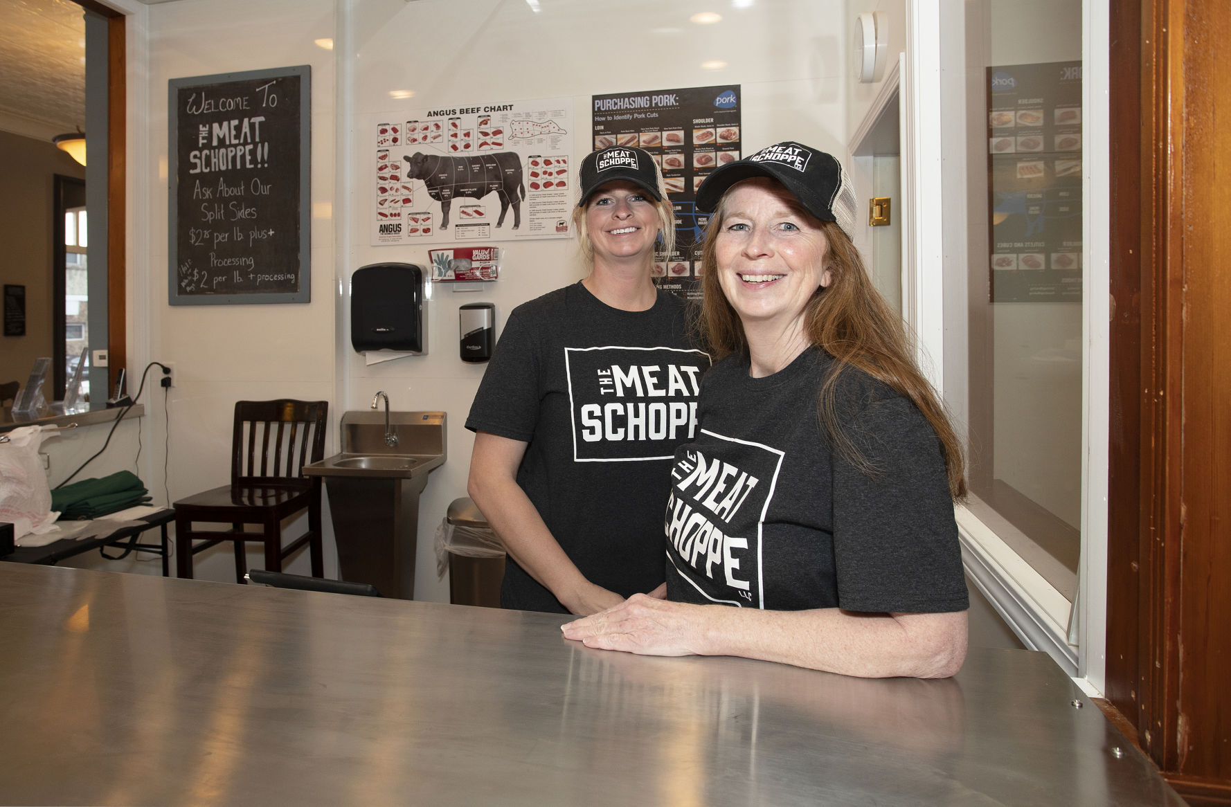 Owner Keri Retallick and her daughter Kelsi stand at the sales counter in The Meat Schoppe in Lancaster, Wis., on Thursday, May 27, 2021. PHOTO CREDIT: Stephen Gassman