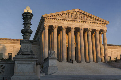 In this Nov. 6, 2020 photo, The Supreme Court is seen as sundown in Washington. (AP Photo/J. Scott Applewhite) PHOTO CREDIT: J. Scott Applewhite