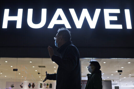 Huawei is launching its own HarmonyOS mobile operating system on its handsets as it adapts to losing access to Google mobile services two years ago after the U.S. put the Chinese telecommunications company on a trade blacklist.  PHOTO CREDIT: Ng Han Guan