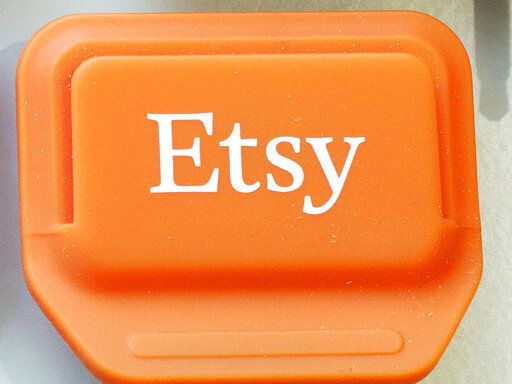 FILE - This Jan. 6, 2015 file photo shows an Etsy mobile credit card reader, in New York. Etsy said Wednesday, June 2, 2021, that it will buy Depop, an app that’s popular among young people looking to buy and sell used clothing and vintage fashions from the early 2000s. (AP Photo/Mark Lennihan, File) PHOTO CREDIT: Mark Lennihan