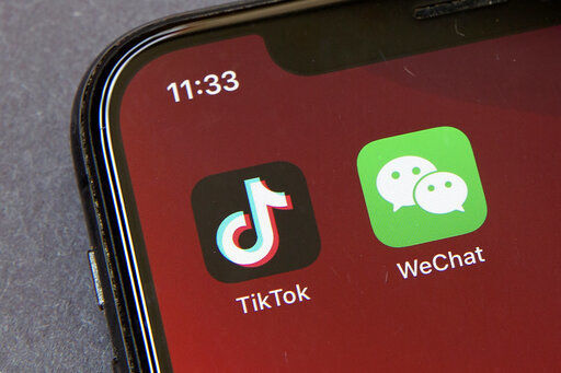 Officials say the White House has dropped Trump-era executive orders that attempted to ban the popular apps TikTok and WeChat and will conduct its own review aimed at identifying national security risks with software applications tied to China. PHOTO CREDIT: Mark Schiefelbein