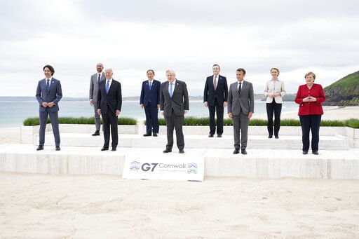 Leaders of the G7 pose for a group photo on overlooking the beach at the Carbis Bay Hotel in Carbis Bay, St. Ives, Cornwall, England, Friday, June 11, 2021. Leaders from left, Canadian Prime Minister Justin Trudeau, European Council President Charles Michel, U.S. President Joe Biden, Japan