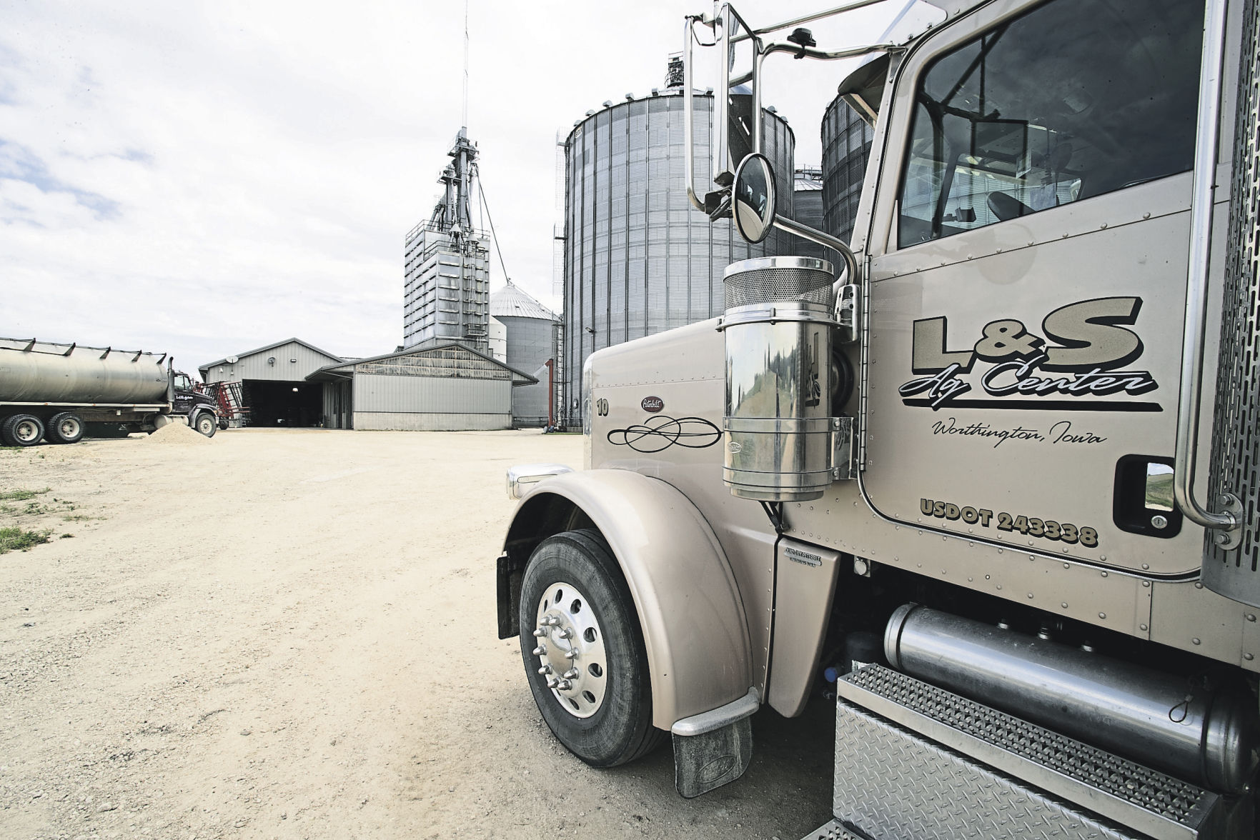 Trucks haul in grain at L&S Ag Center.    PHOTO CREDIT: Stephen Gassman