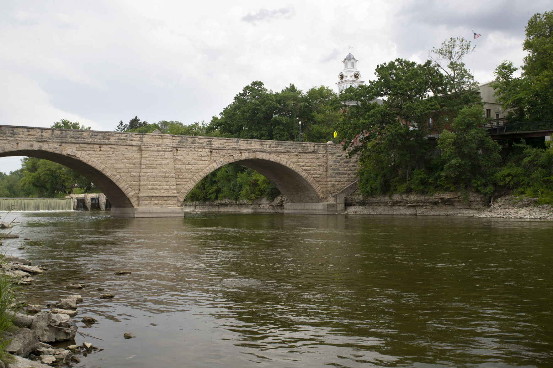 The Clayton County Courthouse and historic keystone arch bridge in Elkader, Iowa. Elkader will be celebrating its 175th Anniversary and Founders Day Celebration on Saturday, June 19.    PHOTO CREDIT: Stephen Gassman