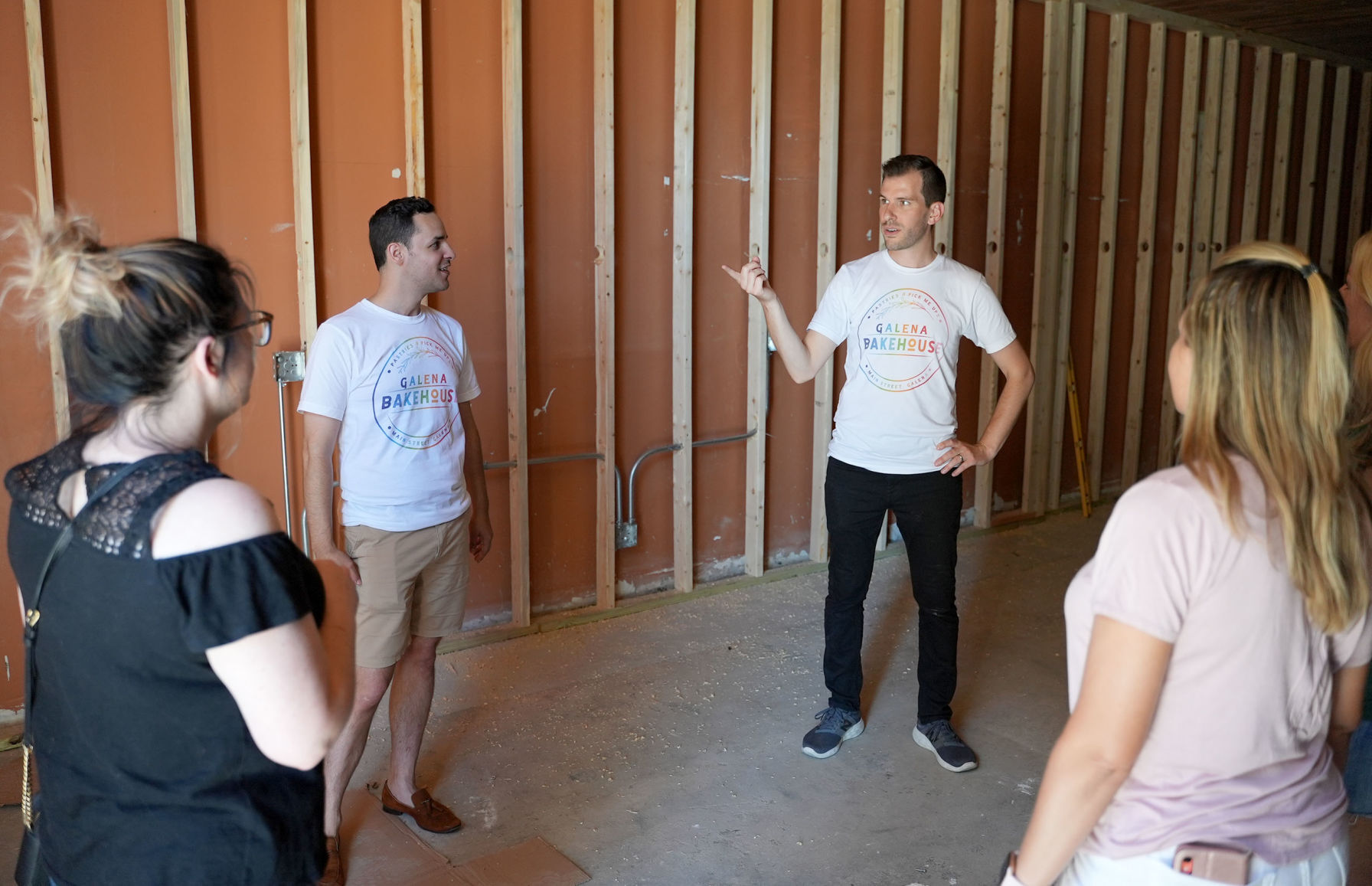 Owners, Alex Arroyo (left) and Geoff Karnish give a tour of the current interior of the Galena Bakehouse at 421 S. Main St. in Galena, Ill. They plan to be open for business in early August. Photo taken on Saturday, June 19, 2021.    PHOTO CREDIT: PAUL KURUTSIDES