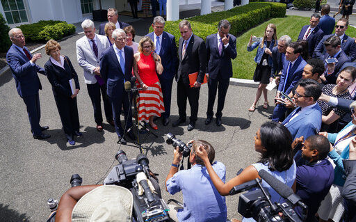 President Joe Biden, with a bipartisan group of Senators, speaks Thursday June 24, 2021, outside the White House in Washington. Biden invited members of the group of 21 Republican and Democratic senators to discuss the infrastructure plan. (AP Photo/Evan Vucci) PHOTO CREDIT: Evan Vucci