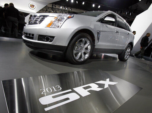 General Motors is recalling more than 380,000 older SUVs in the U.S., many for a second time, to fix a suspension problem that can cause them to sway at highway speeds. The recall covers 2010 through 2016 Cadillac SRX and 2011 and 2012 Saab 9-4X SUVs. PHOTO CREDIT: Richard Drew