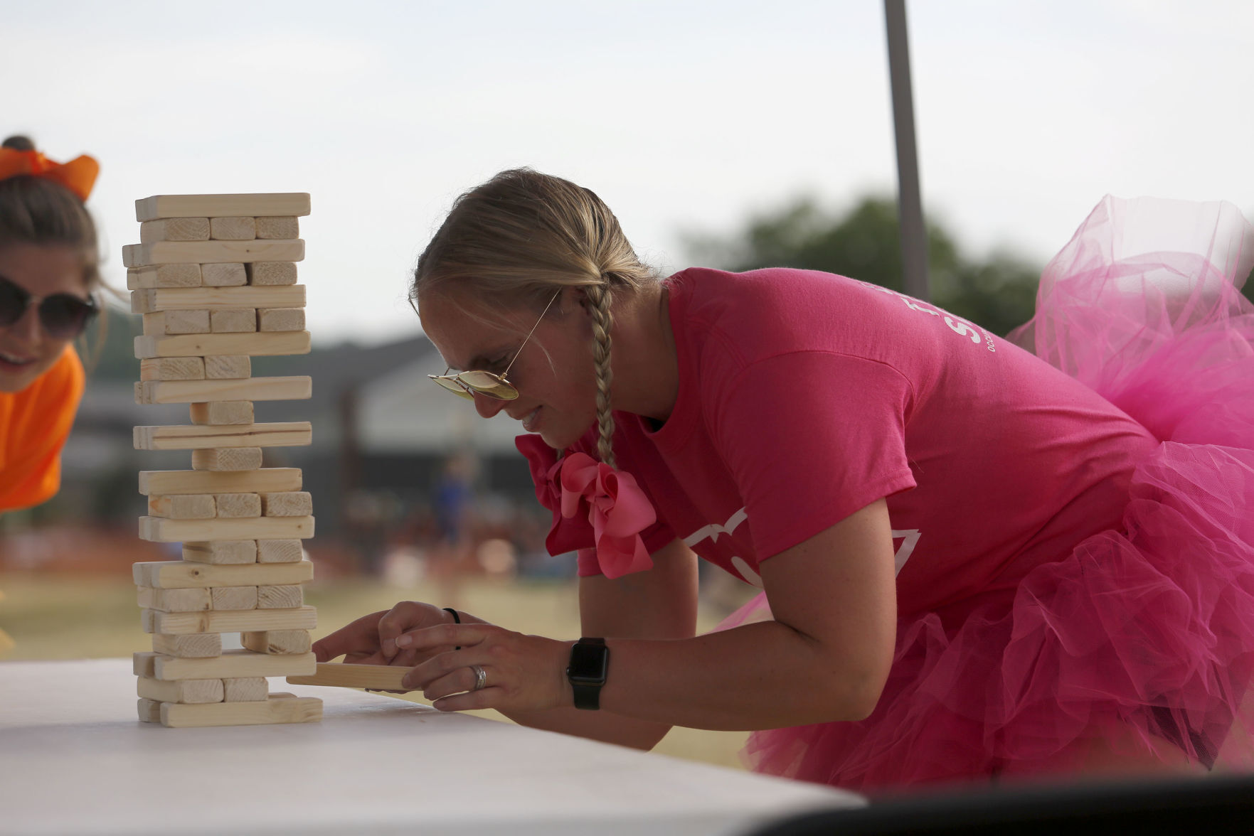 Michelle Sullivan with Unified Therapy Services does Jenga at the Area Residential Care Corporate and Community game night at the Port of Dubuque on Friday, June 11, 2021.    PHOTO CREDIT: Katie Goodale