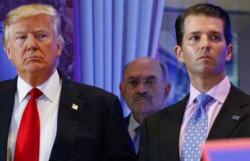 Trump Organization CFO Allen Weisselberg (center) surrendered to authorities early today ahead of expected charges against him and former President Donald Trump