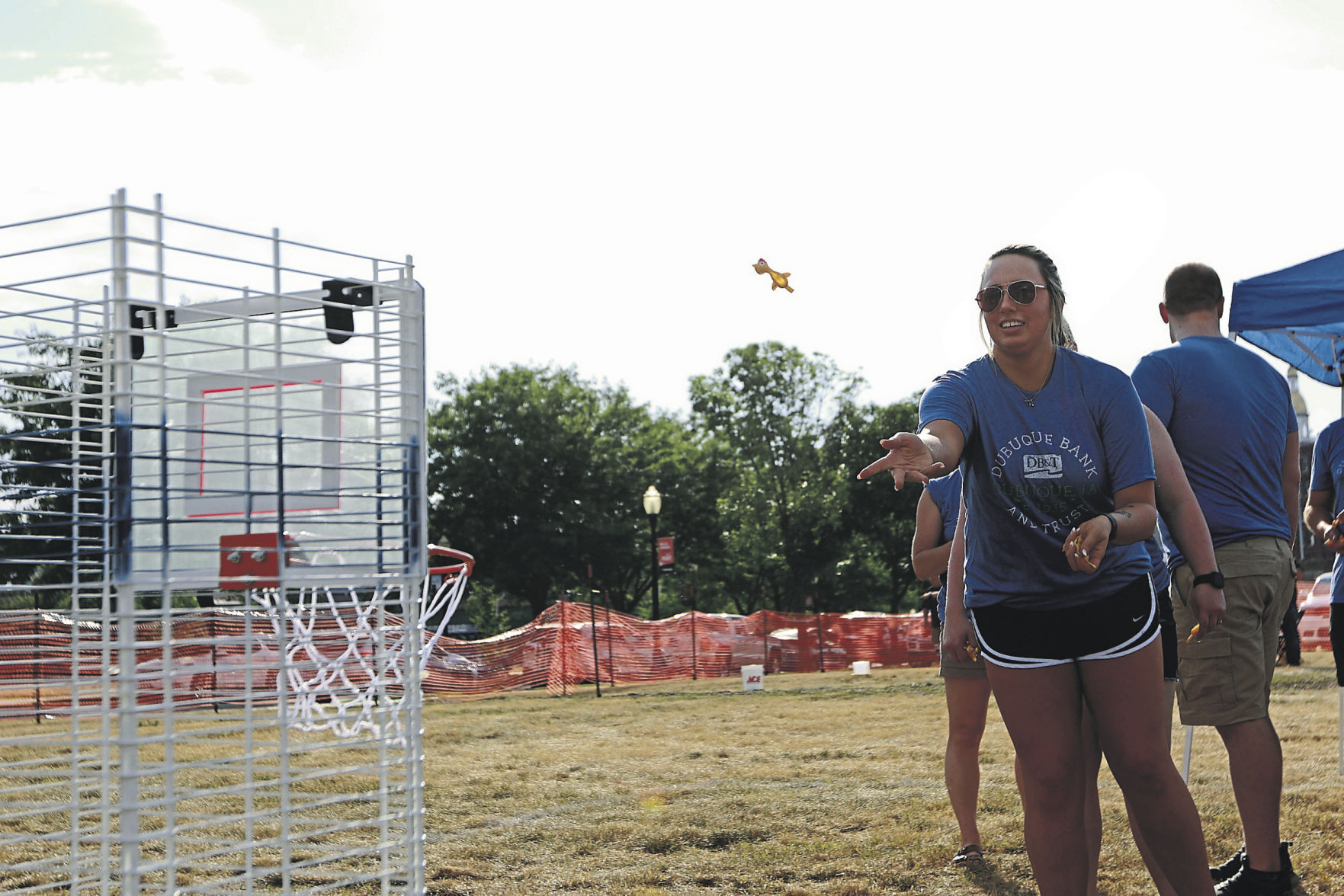 Madeline Foust with Dubuque Bank and Trust throws a rubber chicken at the Area Residential Care Corporate and Community game night at the Port of Dubuque on Friday, June 11, 2021.    PHOTO CREDIT: Katie Goodale