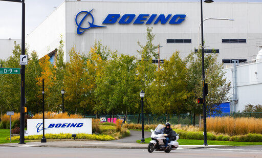 Boeing will cut production of its large 787 aircraft after a structural flaw was discovered in some undelivered planes. The production rate for the 787, which it calls the Dreamliner, will fall below five per month and the Chicago company said today that it now anticipates that it will deliver less than half of the 787s remaining in its inventory this year. PHOTO CREDIT: Ellen M. Banner