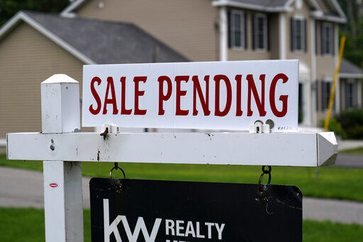 Mortgage rates were mixed this week, according to mortgage buyer Freddie Mac. PHOTO CREDIT: Charles Krupa