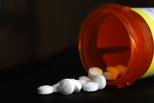 FILE - This Aug. 29, 2018, file photo shows an arrangement of Oxycodone pills in New York. A $26 billion settlement between the three biggest U.S. drug distribution companies and drugmaker Johnson & Johnson and thousands of states and municipalities that sued over the toll of the opioid crisis is certainly significant, but it is far from tying a neat bow on the tangle of still unresolved lawsuits surrounding the epidemic. (AP Photo/Mark Lennihan, File)    PHOTO CREDIT: Mark Lennihan