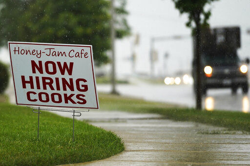 A hiring sign is shown in Downers Grove, Ill., Thursday, June 24, 2021. The number of Americans collecting unemployment benefits slid last week, another sign that the job market continues to recover rapidly from the coronavirus recession. Jobless claims dropped by 24,000 to 400,000 last week, the Labor Department reported Thursday, July 29, 2021. (AP Photo/Nam Y. Huh, File)    PHOTO CREDIT: Nam Y. Huh